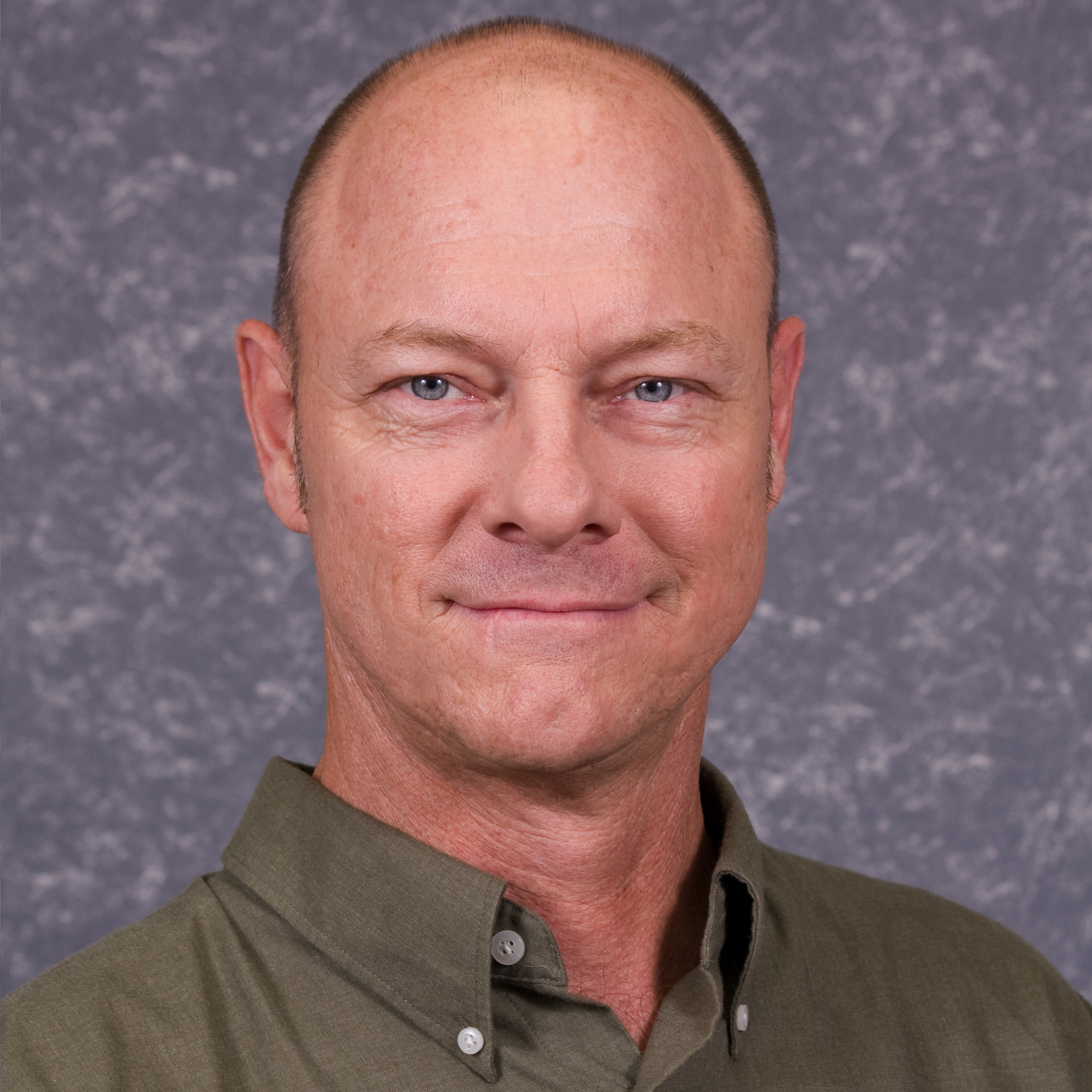 Headshot portrait of Paul Monaghan, associate professor of Extension education
