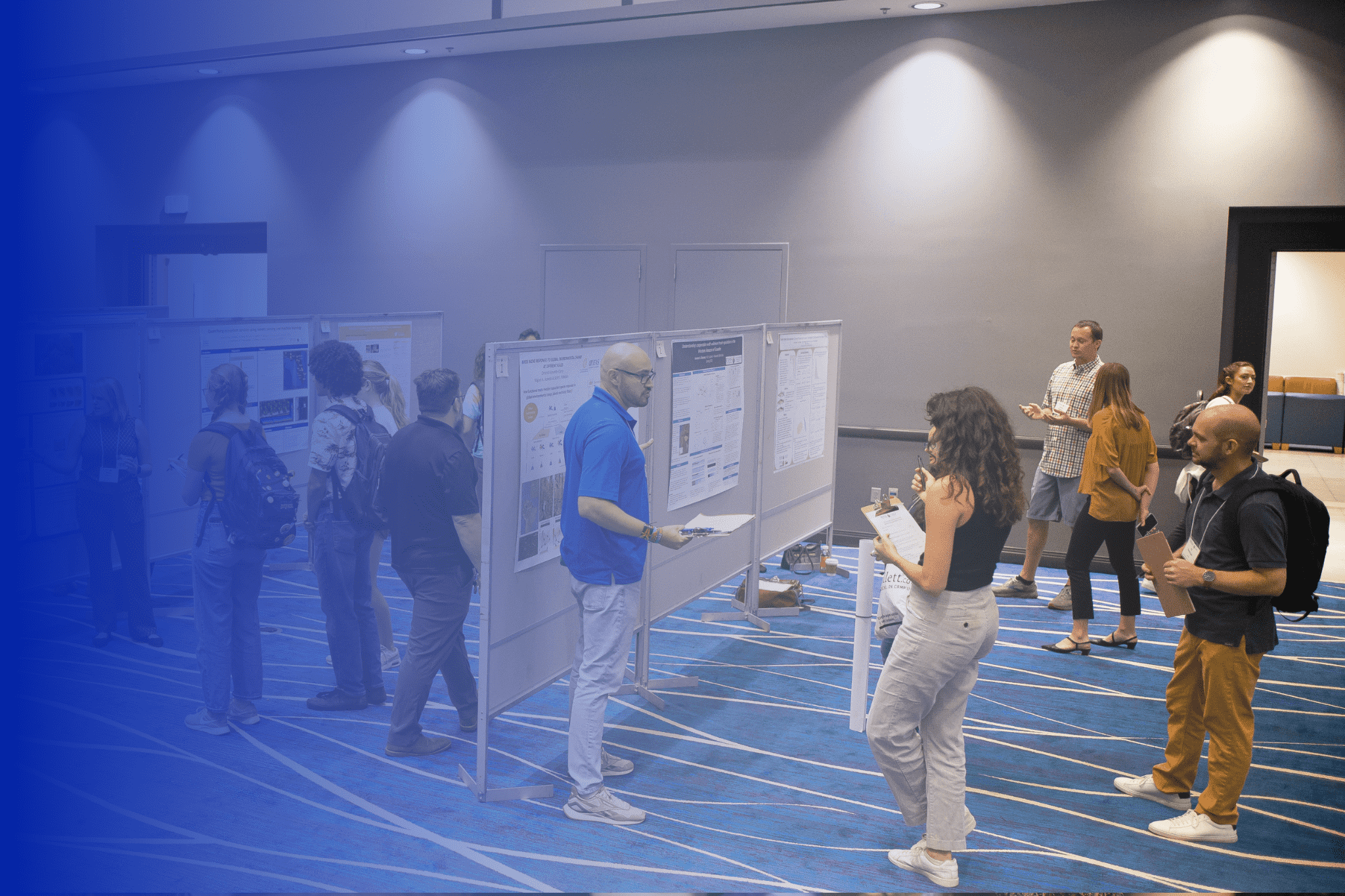 People presenting their scientific posters